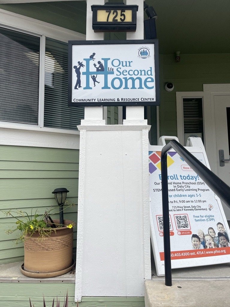 The Our Second Home Community Learning & Resource Center sign at 725 Price Street