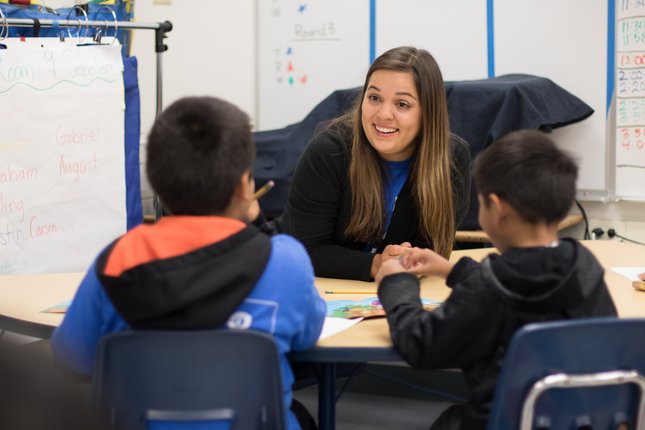 Danielle Webber, a teacher, talks to students enrolled in the Inspiring Summers educational program on June 29 at Spruce Elementary School in South San Francisco. (Courtesy of the Silicon Valley Community Foundation) Aaron Kinney Reporter Mercury News/Bay Area News Group 650-348-4357 Twitter: @kinneytimes
